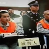 Hai trong số 6 bị cáo bị kết án tử hình tại phiên tòa ở Tân Cương ngày 12/10. (Ảnh: AFP/TTXVN)