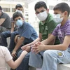 Các nước cần áp dụng những biện pháp cần thiết để hạn chế sự lây lan của dịch H1N1. (Ảnh: THX/TTXVN)