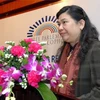 Phó Chủ tịch Quốc hội Tòng Thị Phóng tới dự và phát biểu tại phiên khai mạc. (Ảnh: Nhan Sáng/TTXVN)