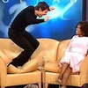 Tom Cruise (trái) trong The Oprah Winfrey Show.