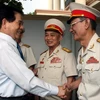 Chủ tịch nước Nguyễn Minh Triết thăm Hội Cựu Chiến binh Thành phố Hồ Chí Minh. (Ảnh: Tràng Dương/TTXVN)