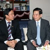 Chủ tịch nước Nguyễn Minh Triết thăm, chúc tết Phó giáo sư-Tiến sĩ Nguyễn Thanh Liêm. (Ảnh: Nguyễn Khang/TTXVN)