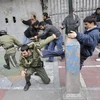 Hình ảnh về vụ bạo loạn ở Iran ngày 27/12/2009. (Ảnh: AP)