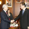 Chủ tịch Hạ viện Indonesia Marzuki Ali đón tiếp Chủ tịch Quốc hội Nguyễn Phú Trọng. (Ảnh: Trí Dũng/TTXVN) 