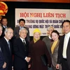 Chủ tịch Quốc hội Nguyễn Phú Trọng với các đại biểu Mặt trận Tổ quốc Việt Nam tại hội nghị . (Ảnh: Nguyễn Dân/TTXVN) 