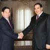 Tổng thống Cộng hòa Tunisia Zeine Al-Abidine Ben Ali đón Chủ tịch nước Nguyễn Minh Triết. (Ảnh: Nguyễn Khang/TTXVN)