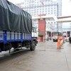 Xe chở hàng hóa sang Trung Quốc qua cửa khẩu Tân Thanh. (Ảnh: Song Toàn/TTXVN) 