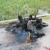 Chiếc xe máy bị thiêu cháy. (Nguồn: Dân Trí)