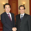 Tổng Bí thư Nông Đức Mạnh tiếp Thủ tướng Nhật Bản Naoto Kan. (Ảnh: Đinh Xuân Tuân/TTXVN)
