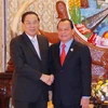 Tổng Bí Thư, Chủ tịch nước CHDCND Lào Chummaly Sayasone tiếp ông Lê Thanh Hải. (Ảnh: Phạm Kiên/TTXVN)