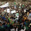Míttinh ủng hộ Chính phủ tại thủ đô Tripoli, Libya ngày 18/2. (Nguồn: AFP/TTXVN)