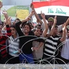 Những người biểu tình phản đối chính phủ ở thành phố Karbala, Iraq ngày 25/2. (Nguồn: AFP/TTXVN)