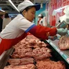Một quầy bán thịt lợn ở Trung Quốc. (Nguồn: THX/TTXVN)