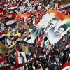Biểu tình ủng hộ Tổng thống Syria Bashar al-Assad. (Nguồn: AFP/TTXVN)