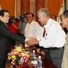 Chủ tịch nước tiếp Đoàn đại biểu Cựu tù chính trị huyện Bình Chánh, Thành phố Hồ Chí Minh. (Ảnh: Nguyễn Khang/TTXVN)