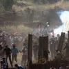 Người biểu tình Palestine cố gắng vượt qua khu vực do Israel kiểm soát tại Majdal Shams, ngày 5/6. (Nguồn: THX/TTXVN)