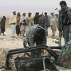 Cảnh sát quốc gia điều tra tại địa điểm xảy ra vụ đánh bom ở Afghanistan ngày 27/2. (Nguồn: AFP/TTXVN)