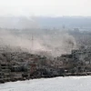 Khói lửa bốc lên tại khu vực Ramleh, phía nam Latakia của Syria ngày 14/8. (Nguồn: AFP/TTXVN)