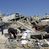 Một cảnh phá hủy sau một vụ không kích tại dải Gaza ngày 25/8. (Nguồn: AFP/TTXVN)