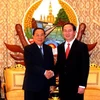 Chủ tịch nước Lào Chummaly Sayasone tiếp Bộ trưởng Trần Đại Quang. (Ảnh: Hoàng Chương/Vietnam+)