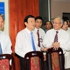 Chủ tịch nước Trương Tấn Sang thăm phòng thực hành xét xử của các học viên Học viện Tư pháp. (Ảnh: Nguyễn Khang/TTXVN)