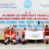 Học sinh trường THCS Đoàn Kết tái hiện quang cảnh Thế vận hội tại lễ phát động cuộc thi. (Ảnh: Minh Tú/TTXVN)