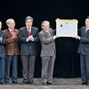 Chủ tịch nước Trương Tấn Sang trao tặng Huân chương Lao động hạng Nhất cho Hội. (Ảnh: Thanh Tùng/TTXVN)