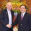 Phó Thủ tướng Hoàng Trung Hải tiếp ngài Vince Cable, Bộ trưởng Kinh doanh, Đổi mới và Kỹ năng (BIS) Vương quốc Anh. (Ảnh: Phương Hoa/TTXVN)