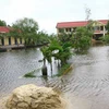 Trường học ở Quảng Điền phải đóng cửa vì lũ. (Ảnh: Hồ Cầu/TTXVN)