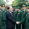 Chủ tịch Quốc hội Nguyễn Sinh Hùng dự Lễ kỷ niệm Ngày nhà giáo Việt Nam tại Học viện Biên phòng. (Ảnh: Nhan Sáng/TTXVN)