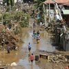 Cảnh tàn phá sau khi bão Washi tràn qua Cagayan de Oroon. (Nguồn: AFP/TTXVN)
