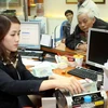 Nhu cầu nhân lực trực tuyến cho ngành ngân hàng trong tháng 12/2011 ở mức thấp nhất so với cả năm. (Ảnh: Trần Việt/TTXVN)