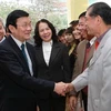 Chủ tịch nước Trương Tấn Sang đến chúc tết Đảng bộ và Nhân dân thành phố Hải Phòng. (Ảnh: Nguyễn Khang/TTXVN)