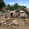 Cảnh tàn phá sau khi bão Washi tràn qua Cagayan de Oroon, Philippines. (Nguồn: AFP/TTXVN)