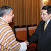 Bộ trưởng Ngoại giao Phạm Bình Minh tiếp ông Lyonpo Kinzang Dorji - Đặc phái viên Thủ tướng Vương quốc Bhutan. (Ảnh: Phương Hoa/TTXVN)