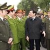 Chủ tịch nước Trương Tấn Sang với cán bộ, chiến sỹ Bộ Tư lệnh Cảnh sát Cơ động. (Ảnh: Doãn Tấn/TTXVN)