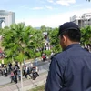 Cảnh sát Kuala Lumpur giám sát một cuộc biểu tình (Ảnh: Xuân Triển/Vietnam+)