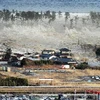 Sóng thần nhấn chìm khu dân cư tại Natori, quận Miyagi (Nhật Bản) ngày 11/3/2011. (Nguồn: Kyodo/TTXVN)