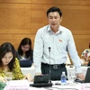 Đại biểu Quốc hội thành phố Hà Nội Trịnh Thế Khiết thảo luận ở tổ. (Ảnh: Doãn Tấn/TTXVN)