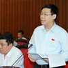 Bộ trưởng Tài chính Vương Đình Huệ giải đáp ý kiến của các đại biểu. (Ảnh: Doãn Tấn/TTXVN)