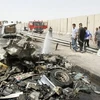 Hiện trường một vụ đánh bom tại Baghdad ngày 16/6. (Nguồn: Reuters)