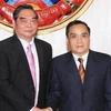 Ủy viên Bộ Chính trị, Thường trực Ban Bí thư Lê Hồng Anh hội kiến với Thủ tướng Lào Thongsing Thammavong. (Ảnh: Thống Nhất/TTXVN)