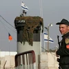 Một người lính Ai Cập đứng gác tại khu vực biên giới với Israel. (Nguồn: AFP/TTXVN)