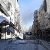 Khói bốc lên sau cuộc giao tranh ác liệt giữa quân chính phủ và lực lượng nổi dậy tại Tadamun, ngoại ô Damascus ngày 4/8. (Nguồn: AFP/TTXVN)