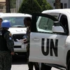 Các giám sát viên LHQ tại thủ đô Damascus ngày 21/7. (Nguồn: THX/TTXVN)