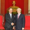 Tổng Bí thư Nguyễn Phú Trọng tiếp Phó Thủ tướng Lào. (Ảnh: Trí Dũng/TTXVN)