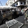 Người dân Syria tại địa điểm xảy ra vụ đánh bom xe ngày 29/8. (Nguồn: AFP/TTXVN)
