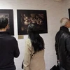 Khách thăm triển lãm. (Ảnh: Lê Hà-Nguyễn Tuyên/Vietnam+)