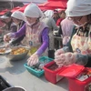 Những phụ nữ Hàn Quốc tham gia một hội chợ địa phương. (Nguồn: Vietnam+)