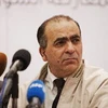 Người phát ngôn của Liên minh Dân tộc đối lập ở Syria, ông Walid al-Bonni phát biểu tại cuộc họp báo ngày 22/2 tại Cairo (Ai Cập). (Nguồn: AFP/TTXVN)